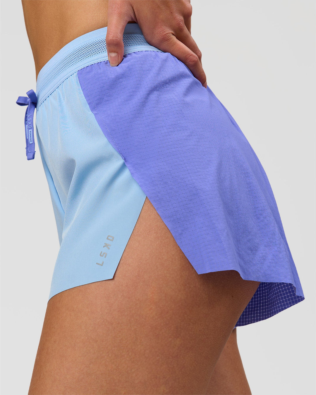 Woman wearing Accelerate 3" High-Rise Running Short - Bluebell-Open Air | Model:Taneisha | Size:XS - view 2