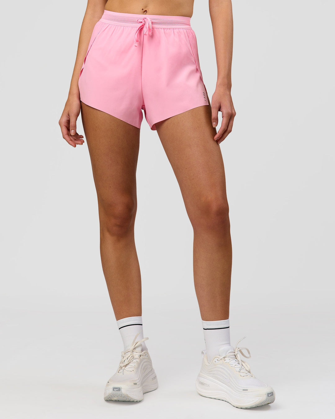 Woman wearing Accelerate 3" High-Rise Running Short - Pink Rose | Model:Taneisha | Size:XS - view 4