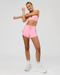 Woman wearing Accelerate 3" High-Rise Running Short - Pink Rose | Model:Taneisha | Size:XS | Thumbnail Index: 1