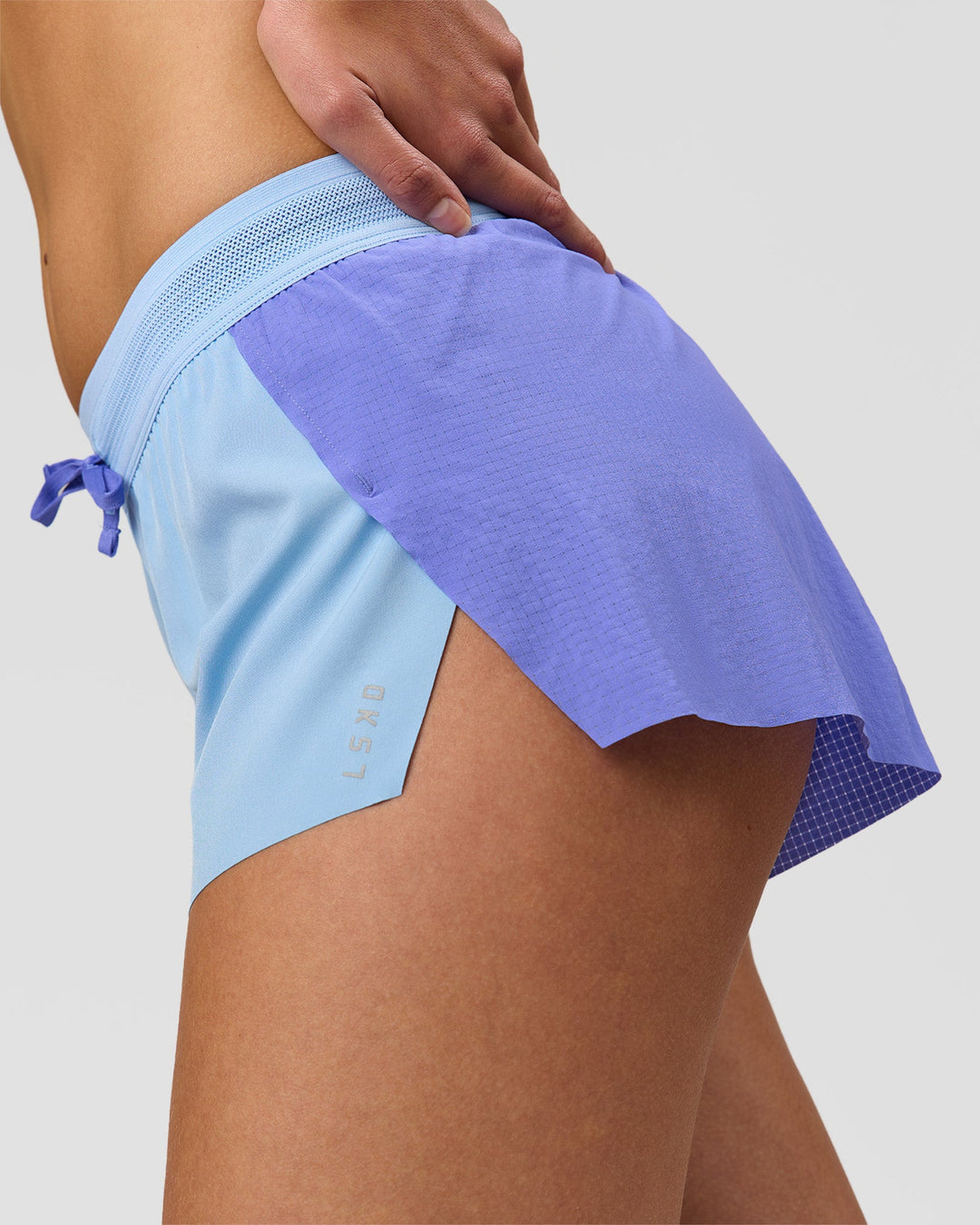 Woman wearing Accelerate 3" Mid-Rise Running Short - Bluebell-Open Air | Model:Taneisha | Size:XS - view 7