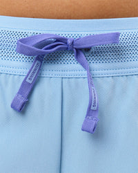Woman wearing Accelerate 3" Mid-Rise Running Short - Bluebell-Open Air | Model:Taneisha | Size:XS | Thumbnail Index: 11