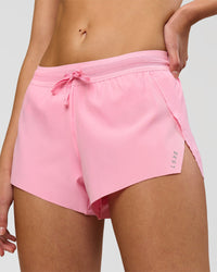 Woman wearing Accelerate 3" Mid-Rise Running Short - Pink Rose | Model:Taneisha | Size:XS