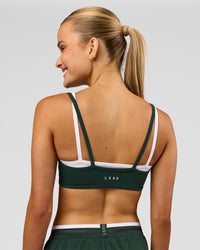 Woman wearing Balance Sports Bra - Midnight Green-White | Model:Taneisha | Size:XS | Thumbnail Index: 1