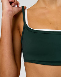 Woman wearing Balance Sports Bra - Midnight Green-White | Model:Taneisha | Size:XS | Thumbnail Index: 4