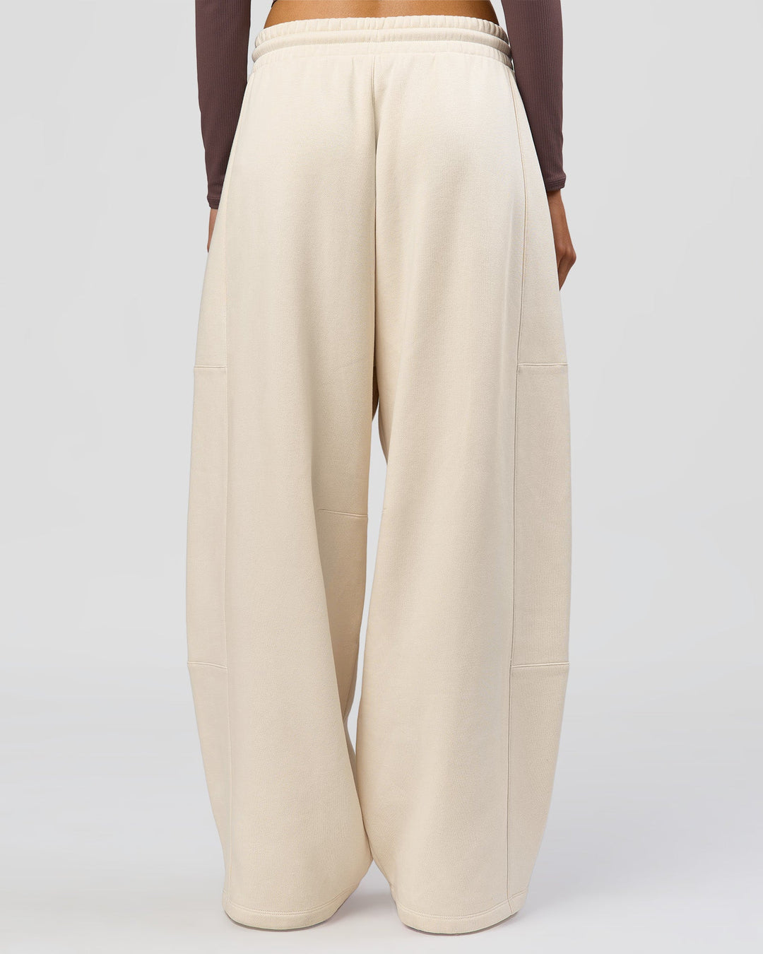 Woman wearing Bree Barrel Fleece Track Pant - Vanilla Bean | Model:Taneisha | Size:XS - view 5