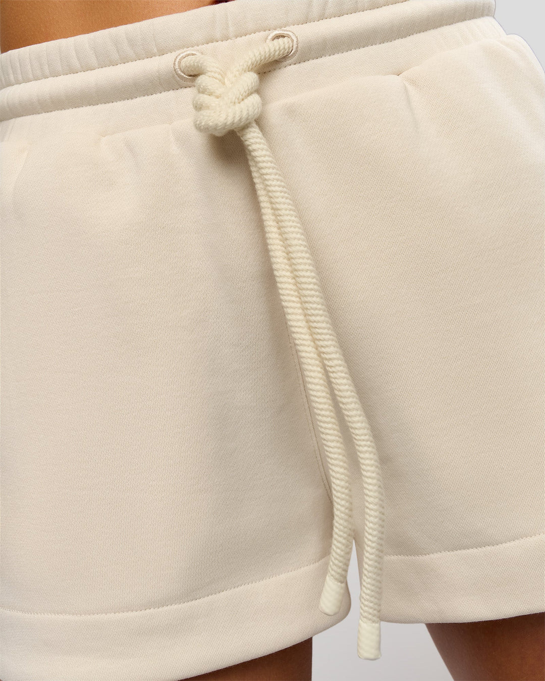 Woman wearing Bree Fleece Track Short - Vanilla Bean | Model:Taneisha | Size:XS - view 10