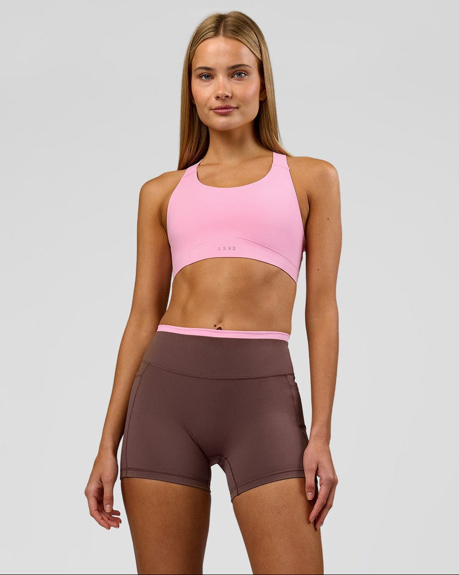 Woman wearing Bree Fusion High-Rise 4" Short Pockets - Cocoa Powder-Pink Rose | Model:Taneisha | Size:XS