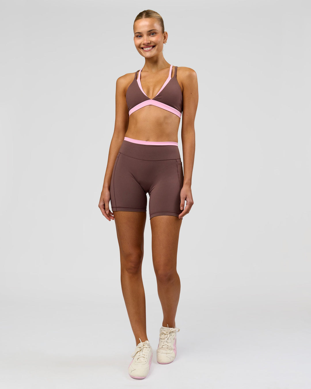 Woman wearing Bree Fusion High-Rise 6" Short Pockets - Cocoa Powder-Pink Rose | Model:Taneisha | Size:XS - view 2