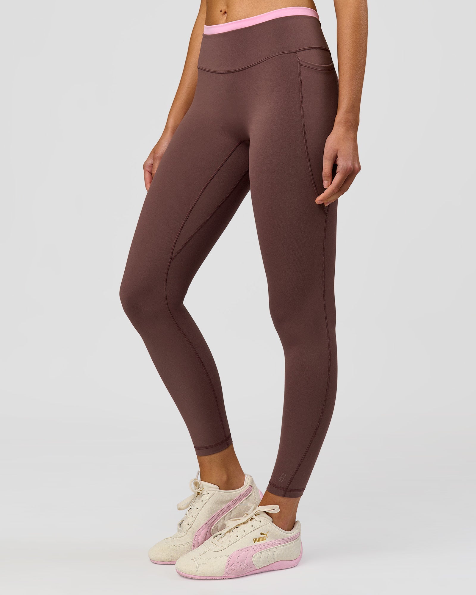 Woman wearing Bree Fusion High-Rise Full Length Legging Pockets - Cocoa Powder-Pink Rose | Model:Taneisha | Size:XS