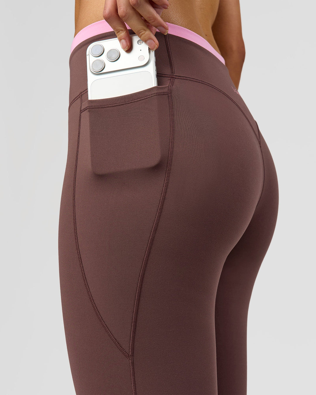 Woman wearing Bree Fusion High-Rise Full Length Legging Pockets - Cocoa Powder-Pink Rose | Model:Taneisha | Size:XS - view 5