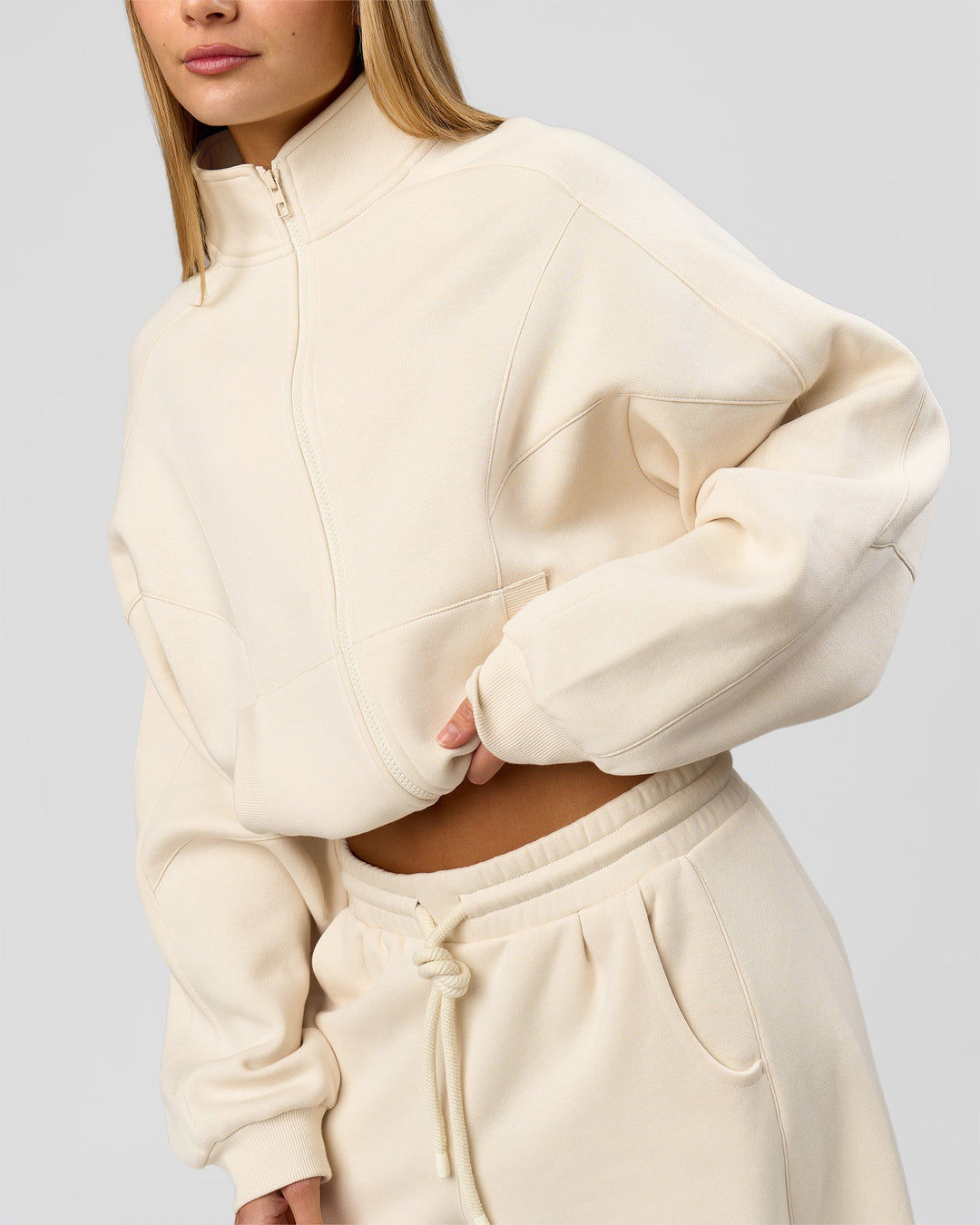 Woman wearing Bree Oversized Fleece Zip Thru - Vanilla Bean | Model:Taneisha | Size:XS - view 1