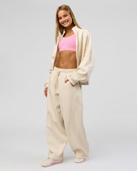 Woman wearing Bree Oversized Fleece Zip Thru - Vanilla Bean | Model:Taneisha | Size:XS | Thumbnail Index: 3