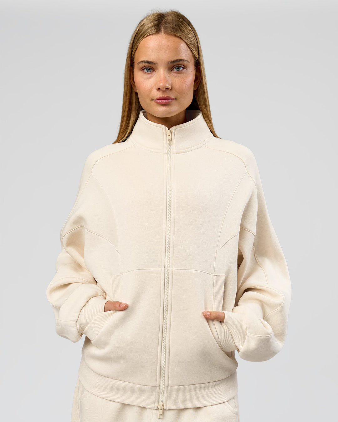 Woman wearing Bree Oversized Fleece Zip Thru - Vanilla Bean | Model:Taneisha | Size:XS - view 9