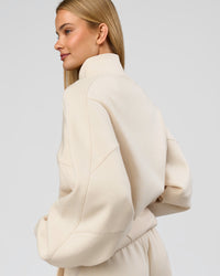 Woman wearing Bree Oversized Fleece Zip Thru - Vanilla Bean | Model:Taneisha | Size:XS | Thumbnail Index: 10
