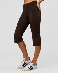 Woman wearing Deep V-Contour High-Rise Flared Capri - Ground Coffee | Model:Taneisha | Size:XS | Thumbnail Index: 2
