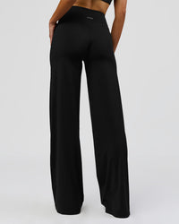 Woman wearing Elixir High-Rise Tall Pant - Black | Model:Taneisha | Size:XS | Thumbnail Index: 4