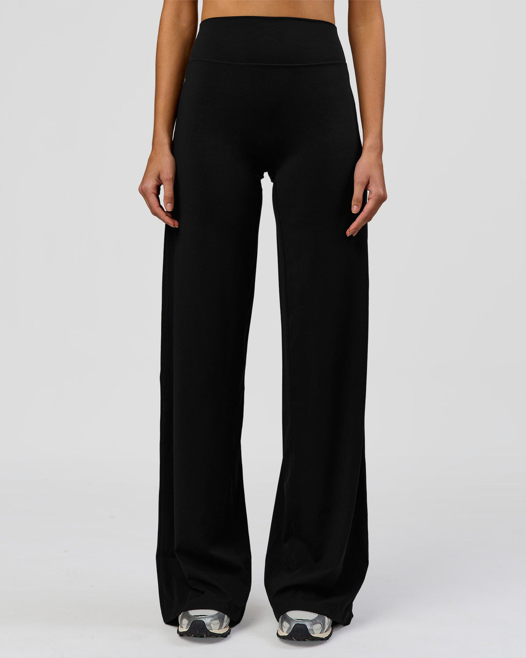 Woman wearing Elixir High-Rise Tall Pant - Black | Model:Taneisha | Size:XS - view 6