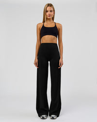 Woman wearing Elixir High-Rise Tall Pant - Black | Model:Taneisha | Size:XS | Thumbnail Index: 0