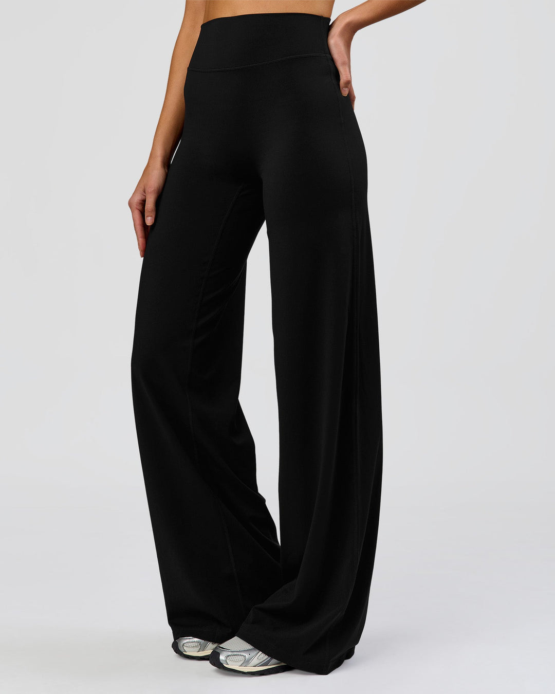 Woman wearing Elixir High-Rise Tall Pant - Black | Model:Taneisha | Size:XS - view 8