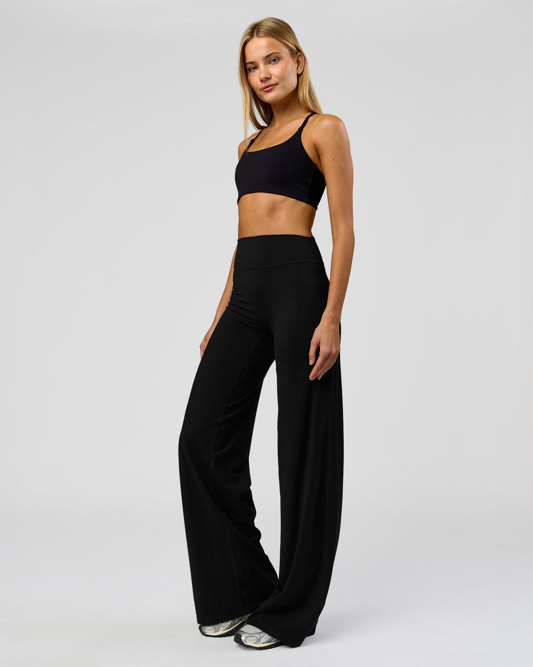 Woman wearing Elixir High-Rise Tall Pant - Black | Model:Taneisha | Size:XS - view 9
