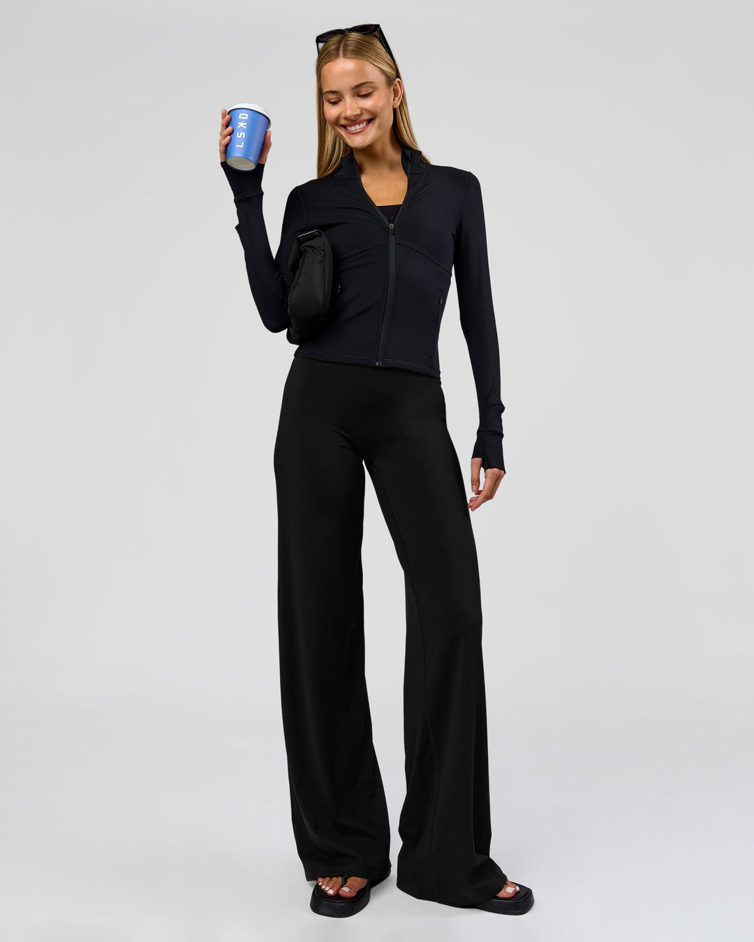 Woman wearing Elixir High-Rise Tall Pant - Black | Model:Taneisha | Size:XS - view 11