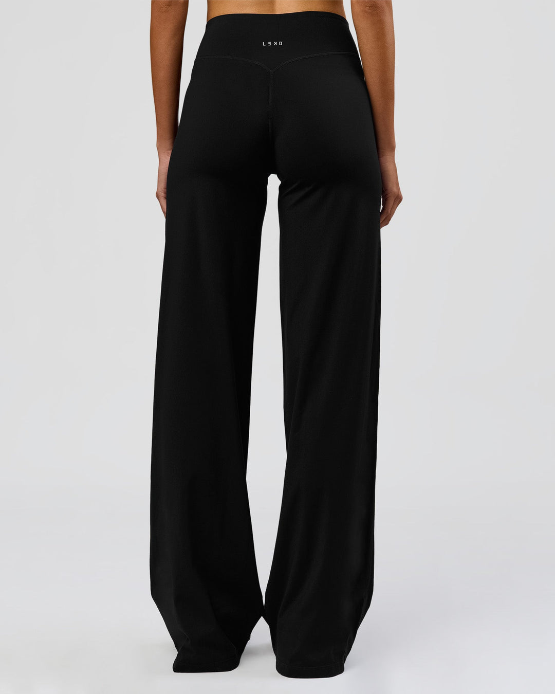 Woman wearing Elixir High-Rise Tall Pant - Black | Model:Taneisha | Size:XS - view 15