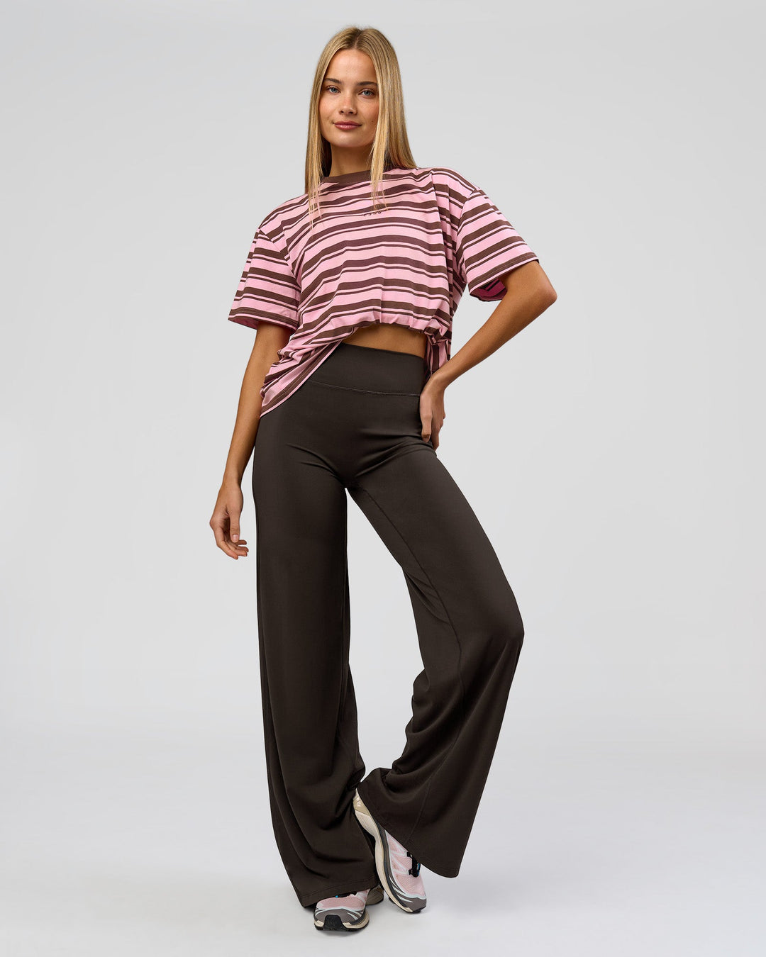 Woman wearing Elixir High-Rise Tall Pant - Ground Coffee | Model:Taneisha | Size:XS - view 3