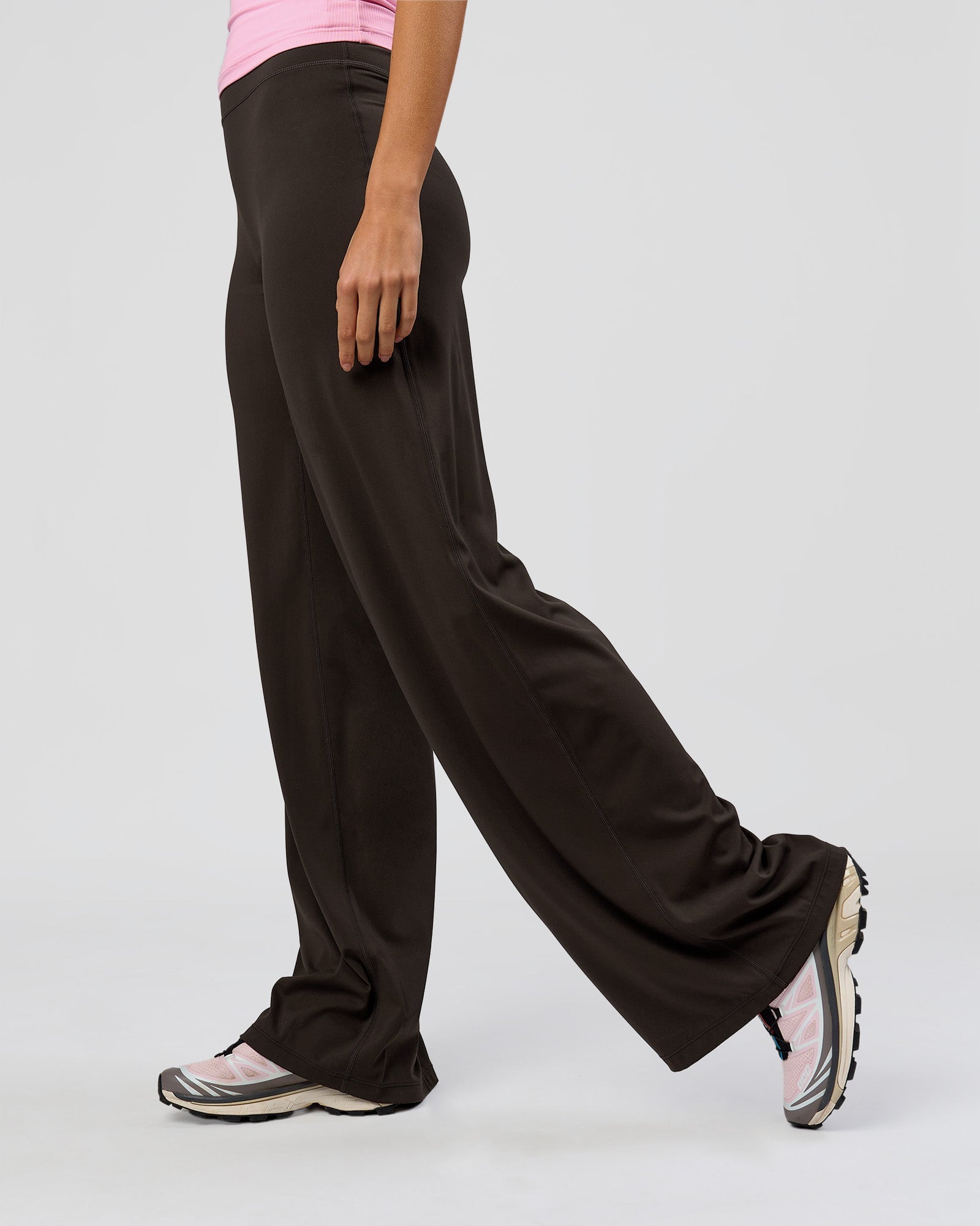 Woman wearing Elixir High-Rise Tall Pant - Ground Coffee | Model:Taneisha | Size:XS