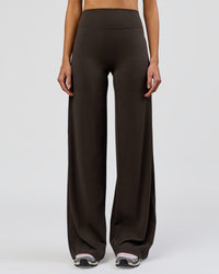 Woman wearing Elixir High-Rise Tall Pant - Ground Coffee | Model:Taneisha | Size:XS | Thumbnail Index: 4