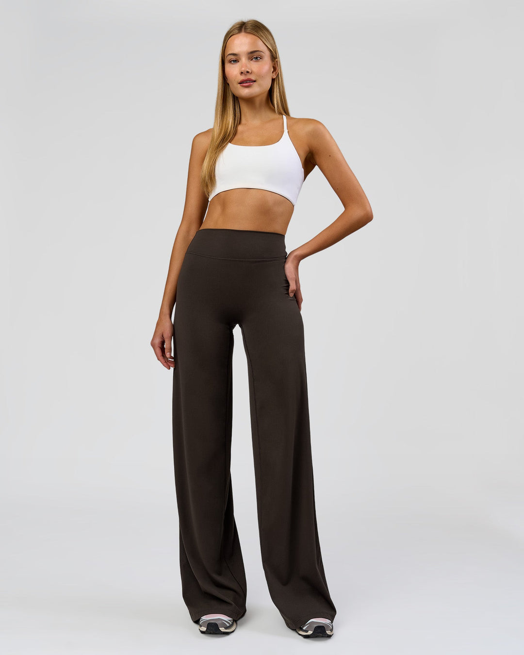 Woman wearing Elixir High-Rise Tall Pant - Ground Coffee | Model:Taneisha | Size:XS - view 6