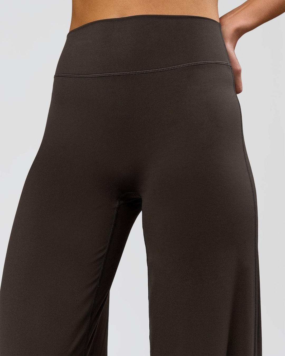 Woman wearing Elixir High-Rise Tall Pant - Ground Coffee | Model:Taneisha | Size:XS - view 7