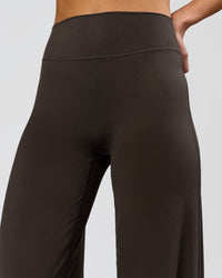 Woman wearing Elixir High-Rise Tall Pant - Ground Coffee | Model:Taneisha | Size:XS | Thumbnail Index: 6