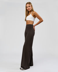 Woman wearing Elixir High-Rise Tall Pant - Ground Coffee | Model:Taneisha | Size:XS | Thumbnail Index: 7