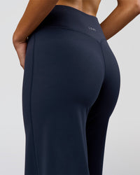Woman wearing Elixir High-Rise Tall Pant - Midnight Navy | Model:Taneisha | Size:XS | Thumbnail Index: 5