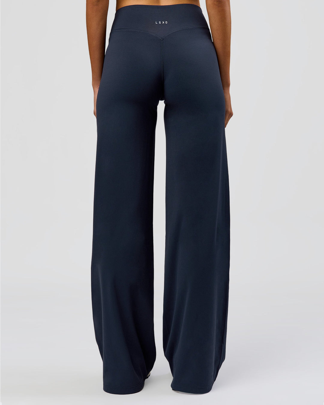 Woman wearing Elixir High-Rise Tall Pant - Midnight Navy | Model:Taneisha | Size:XS - view 4