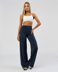 Woman wearing Elixir High-Rise Tall Pant - Midnight Navy | Model:Taneisha | Size:XS | Thumbnail Index: 10