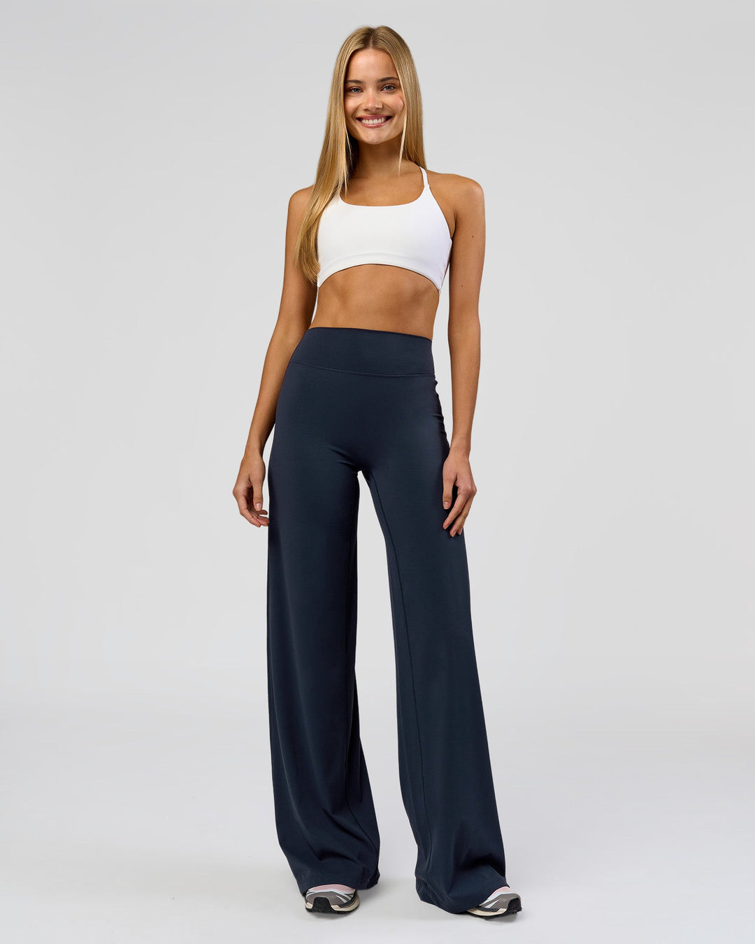 Woman wearing Elixir High-Rise Tall Pant - Midnight Navy | Model:Taneisha | Size:XS - view 9