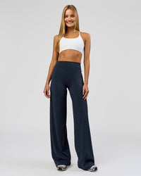 Woman wearing Elixir High-Rise Tall Pant - Midnight Navy | Model:Taneisha | Size:XS | Thumbnail Index: 8