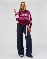 Woman wearing Elixir High-Rise Tall Pant - Midnight Navy | Model:Taneisha | Size:XS | Thumbnail Index: 1