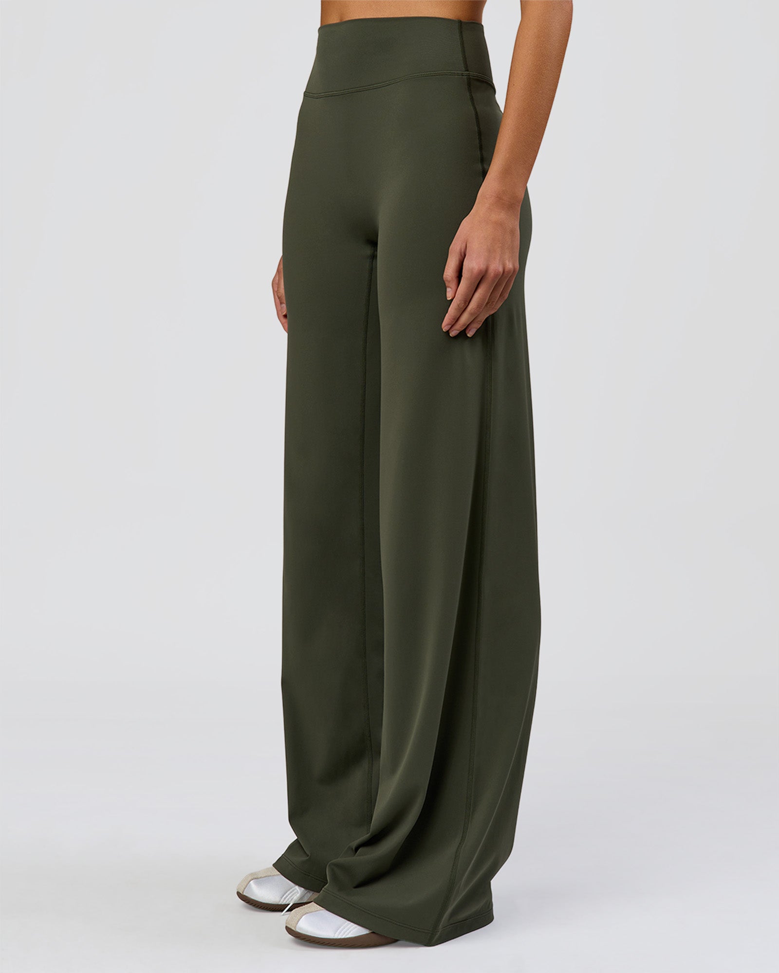 Woman wearing Elixir High-Rise Tall Pant - Pure Olive | Model:Taneisha | Size:XS