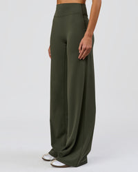 Woman wearing Elixir High-Rise Tall Pant - Pure Olive | Model:Taneisha | Size:XS | Thumbnail Index: 1