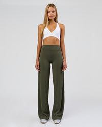 Woman wearing Elixir High-Rise Tall Pant - Pure Olive | Model:Taneisha | Size:XS | Thumbnail Index: 0