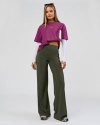 Woman wearing Elixir High-Rise Tall Pant - Pure Olive | Model:Taneisha | Size:XS | Thumbnail Index: 2