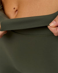 Woman wearing Elixir High-Rise Tall Pant - Pure Olive | Model:Taneisha | Size:XS | Thumbnail Index: 6