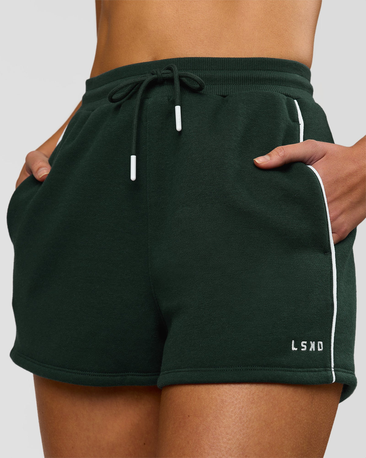 Woman wearing Fast Track Lounge Short - Midnight Green-White | Model:Taneisha | Size:XS