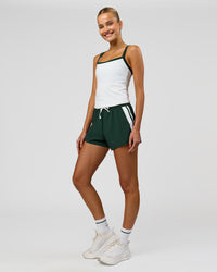 Woman wearing Flame Ribbed Regular Length Tank - White-Midnight Green | Model:Taneisha | Size:XS | Thumbnail Index: 10