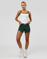 Woman wearing Flame Ribbed Regular Length Tank - White-Midnight Green | Model:Taneisha | Size:XS | Thumbnail Index: 11