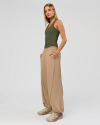 Woman wearing Flow Rib Scoop Neck Tank - Pure Olive | Model:Taneisha | Size:XS | Thumbnail Index: 4