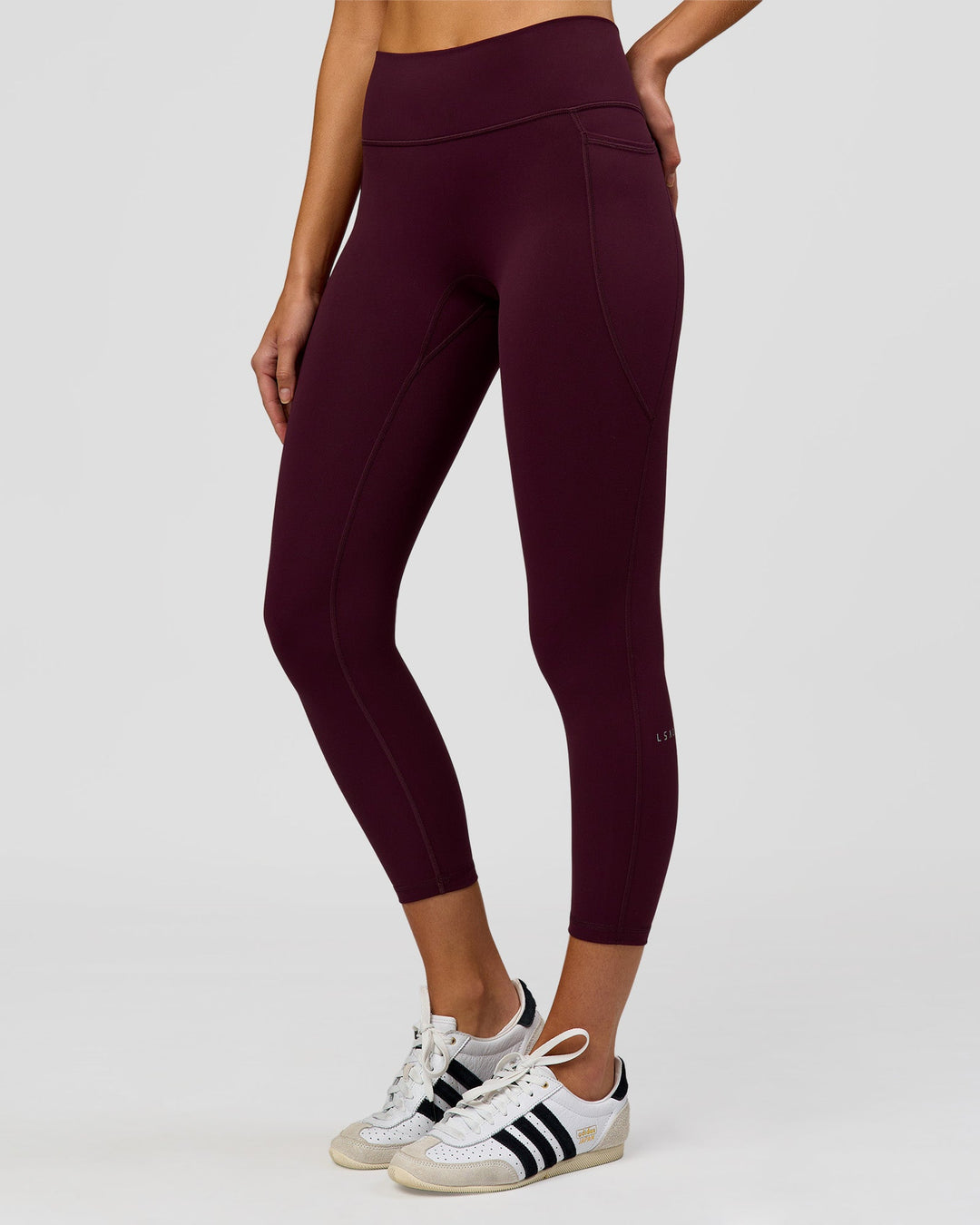 Woman wearing Fusion High-Rise 7/8 Legging Pockets - Cherry Lacquer | Model:Taneisha | Size:XS - view 1
