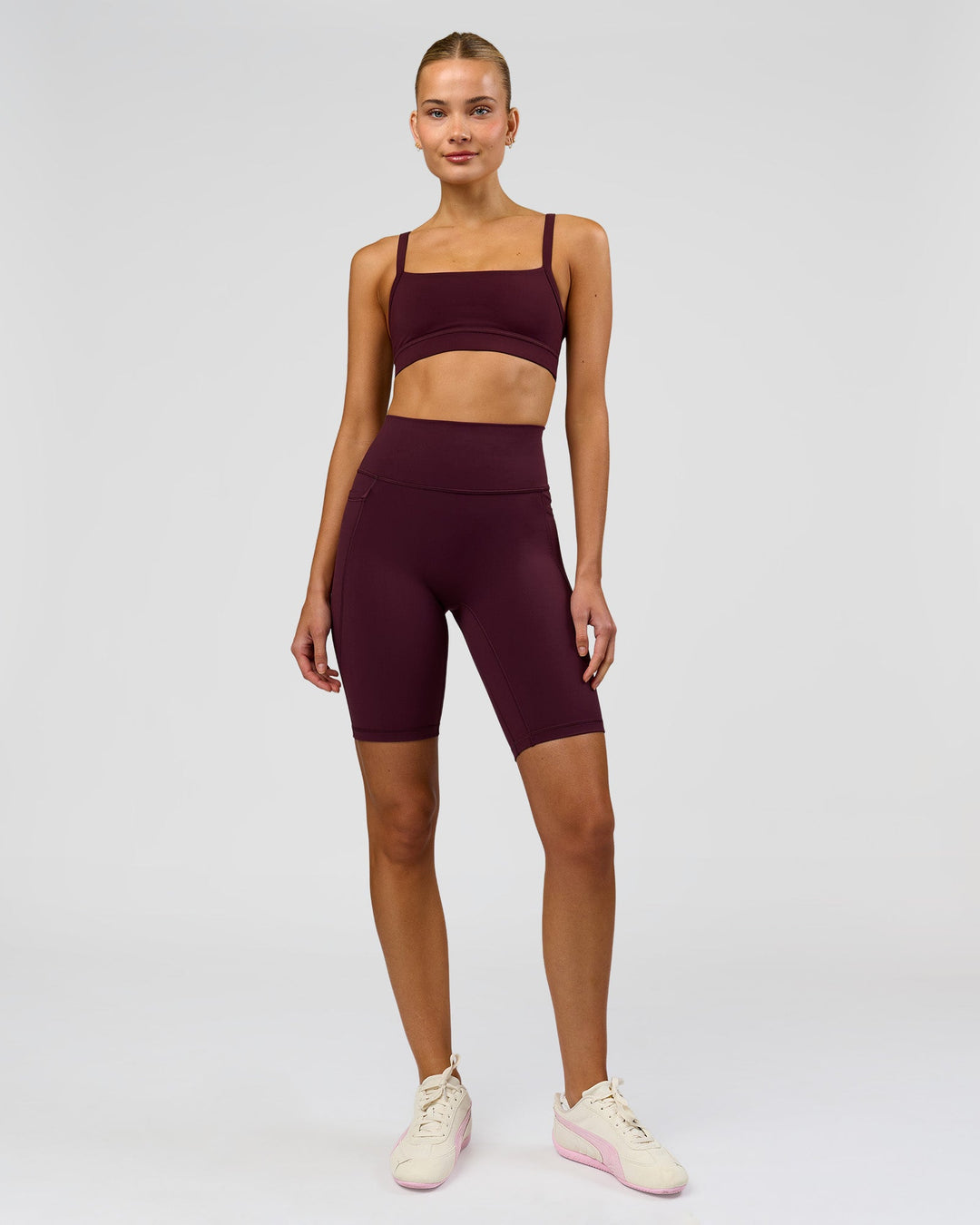 Woman wearing Fusion Ultra High-Rise 9" Short Pockets - Cherry Lacquer | Model:Taneisha | Size:XS - view 7